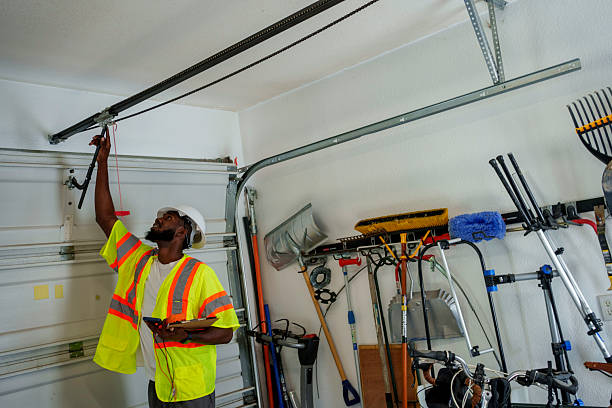 Professional Garage Door Panel Replacement technician working in Spearville, KS