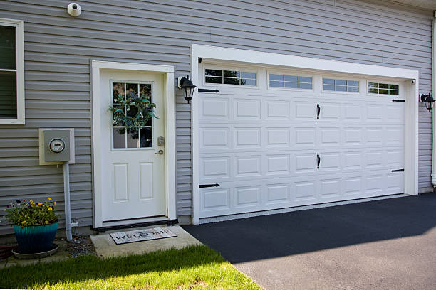 24/7 Emergency Garage Door Panel Replacement experts in Spearville, KS